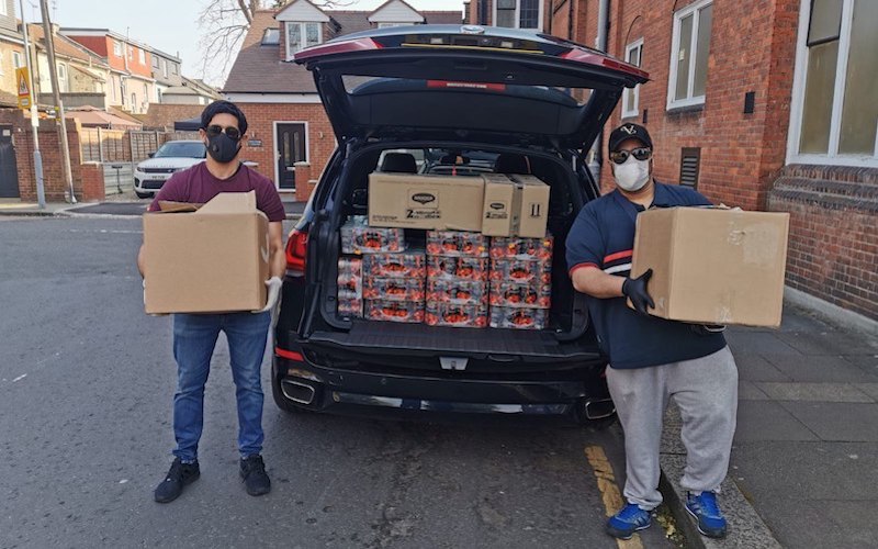 Ahmadiyya Muslim Youth members delivering food in Ilford
