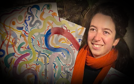 Artist holding the paintings of her migraines