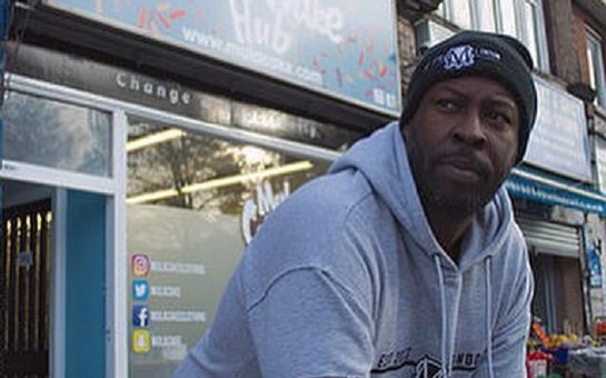 Dexter Simms outside the Mula Cake Community Hub