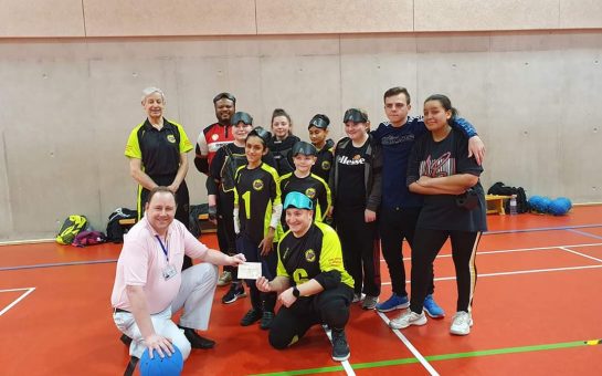 TRANSFORMED: Thomas Britton (centre) with Croysutt Warriors teammates