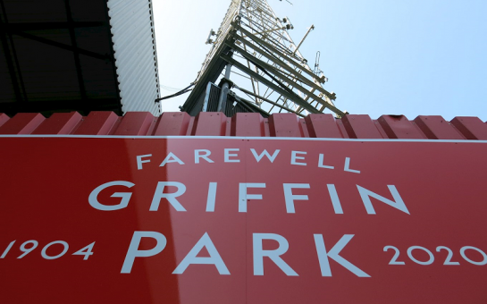 A red sign saying farewell Griffin Park