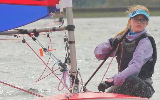 Joanna Leake on her Topper boat on the water