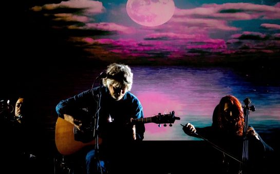 John Bramwell onstage with guitar