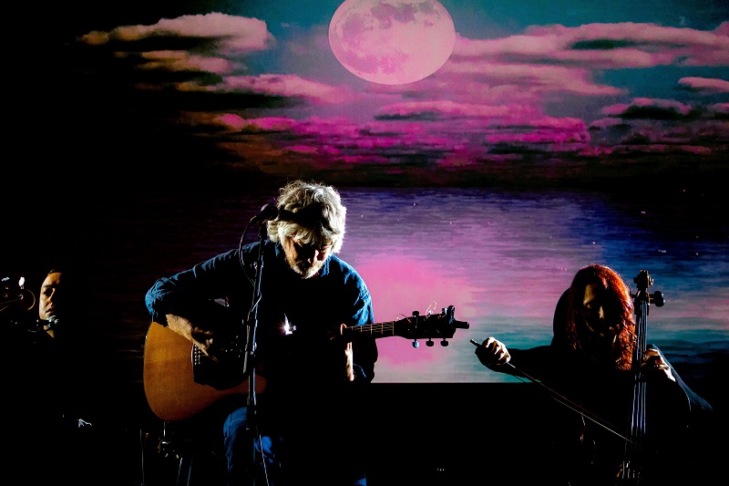 John Bramwell onstage with guitar