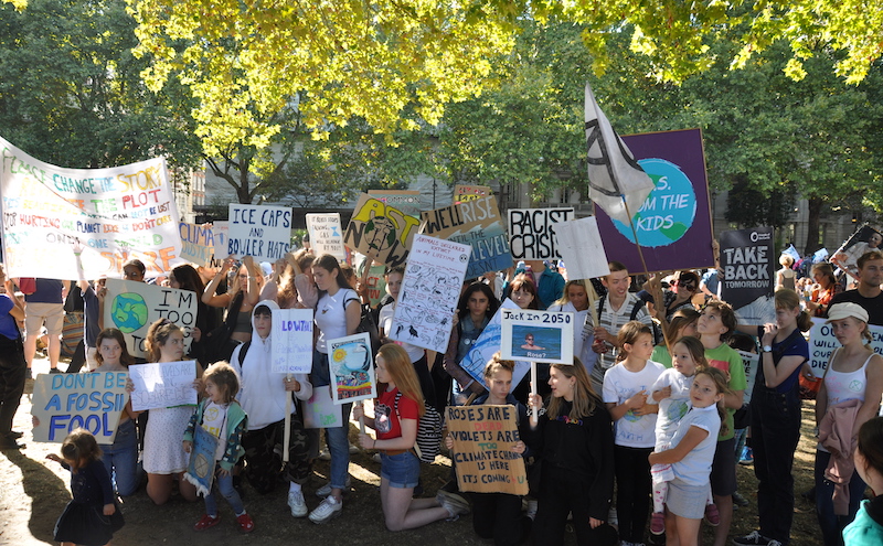 Children pose for a photograph at the global climate strike.