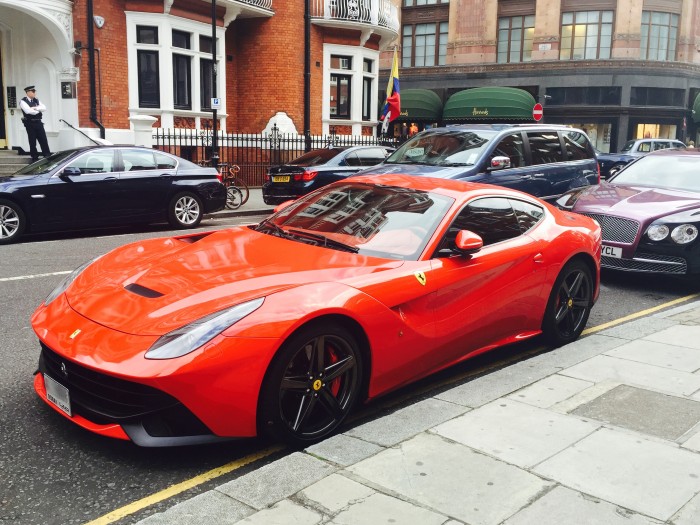 Knightsbridge red ferrari side