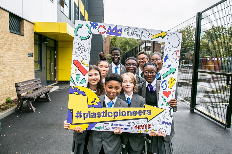 Children celebrate the Plastic Pioneers campaign to reduce single use plastic