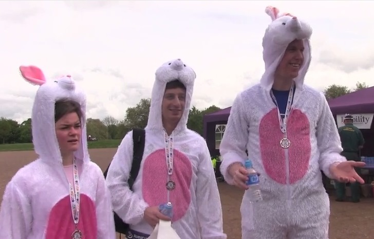 Rampant rabbit runners donning fluffy tails and bunny masks to raise ...