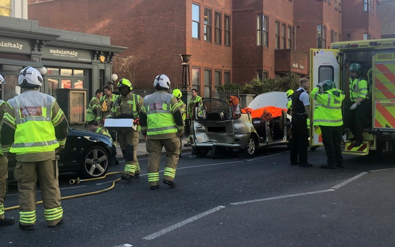 At least two injured as firemen cut open car after crash in Wimbledon
