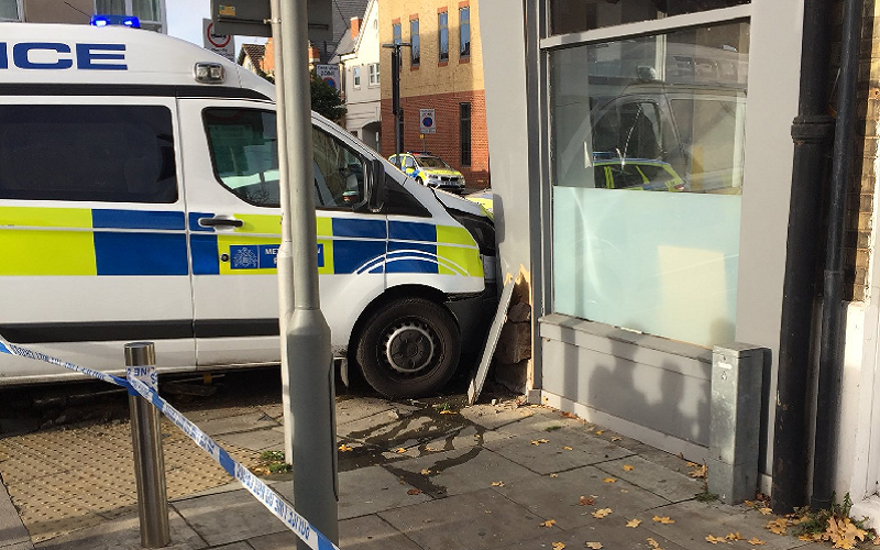 BREAKING Car and Police van crash into shopfront in Wimbledon South
