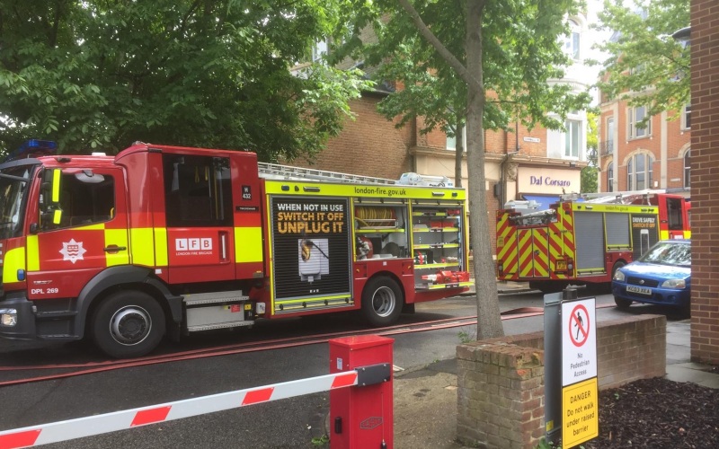 garden fire behind petrol station evacuates twickenham