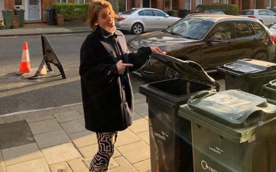 Annemarie Plas opening her wheelie bin in Streatham