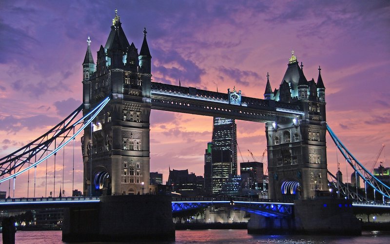 London Bridge against a purple sunset sky