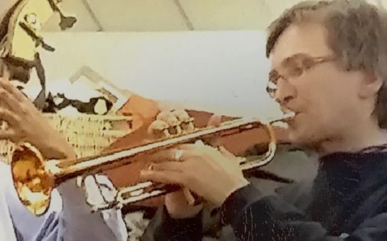 William Blaise Algar playing the trumpet
