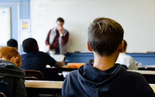 Boy at school in classroom