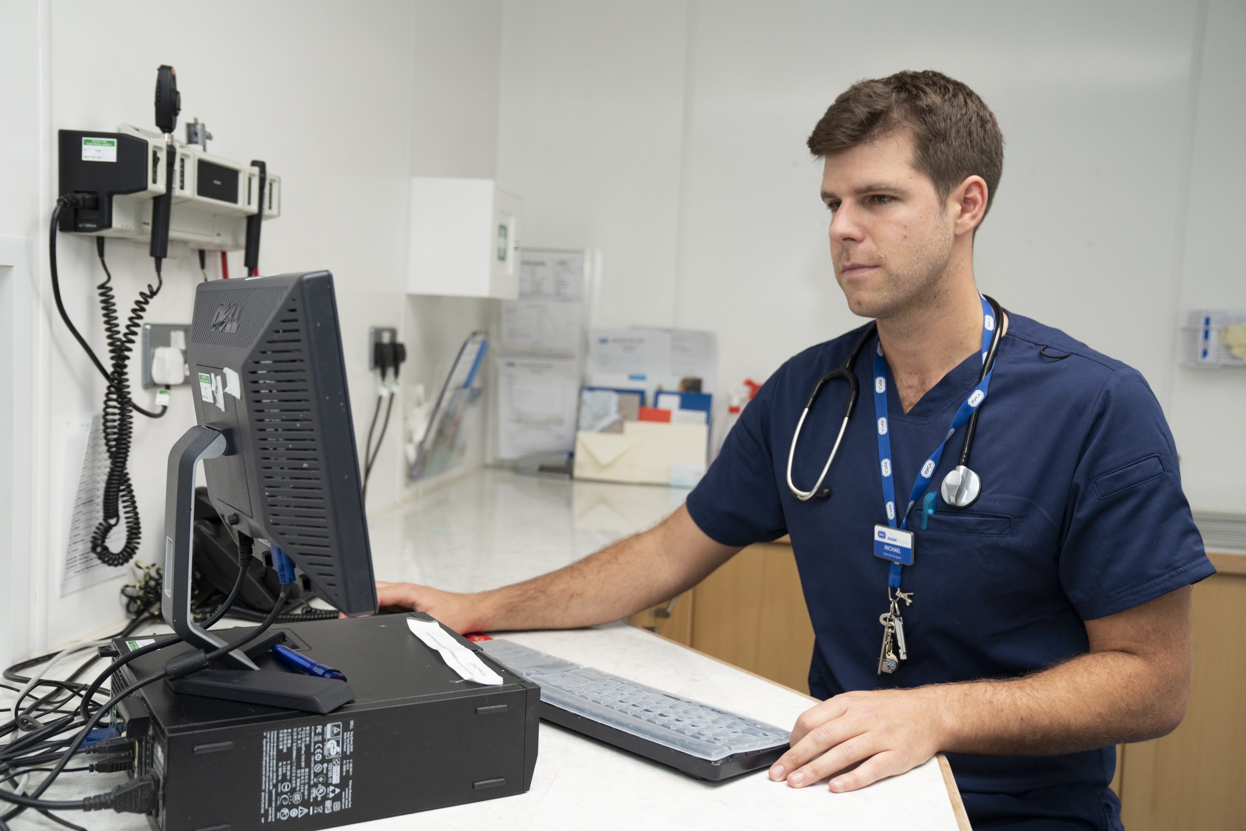 Vet Michael Lazaris on the computer