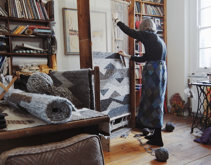 Rachel Scott, weaver, at home weaving a rug 