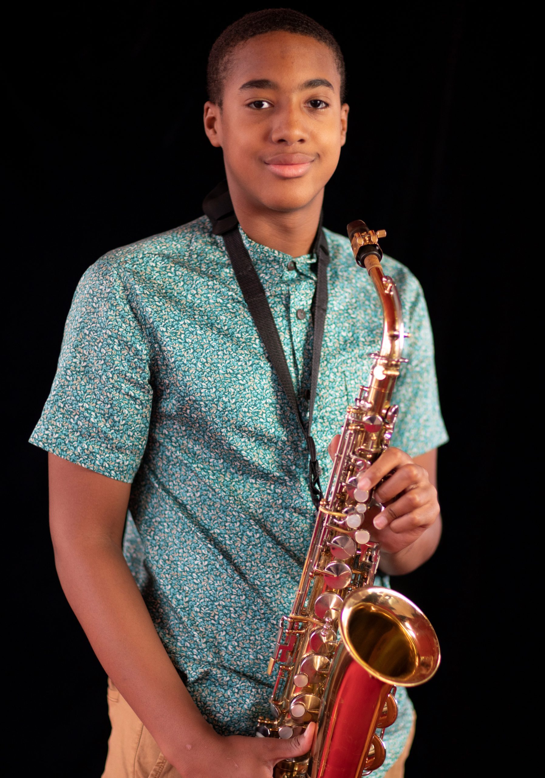 Toku Ogwang, one of the students selected for the jazz programme is pictured with his saxophone.