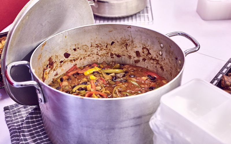 A pot showing a typical dish made in the Cook to Care kitchen 