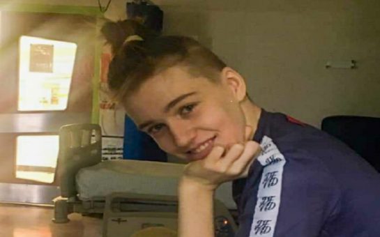 Ben in hospital smiling after his sixth round of chemotherapy.
