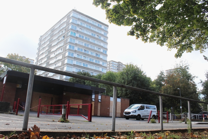 A car park and boarded up building on the Surrey Lane estate.