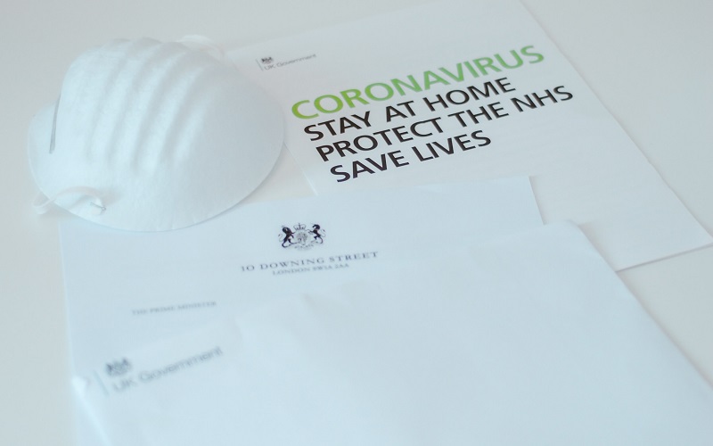 coronavirus mask and letter