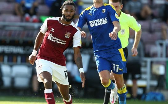 ex-carshalton winger ricky korboa in a challenge