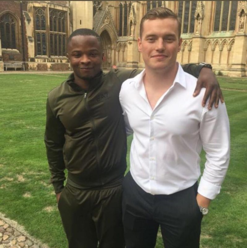 Rosca Onya and Jack Merritt pose for photo together in Cambridge