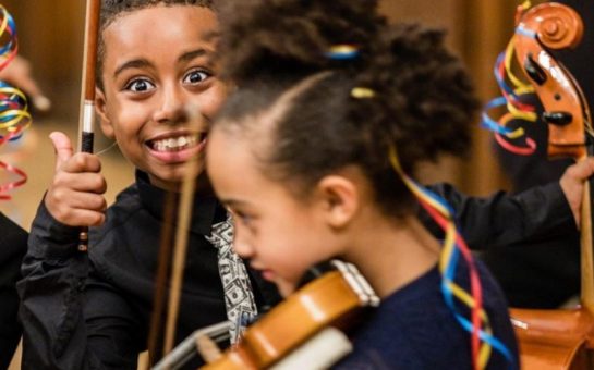 children playing music