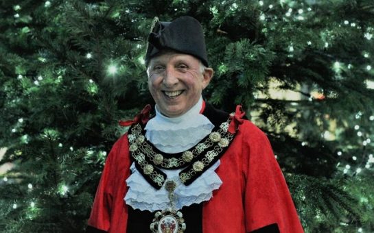 Richmond's Mayor stood in front the tree