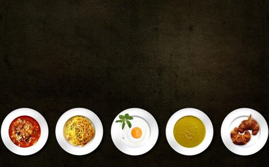 expensive dishes against a black background