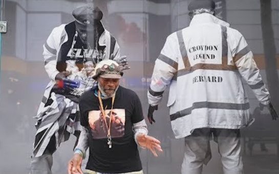 croydon legend bernard dances in front of tribute wall