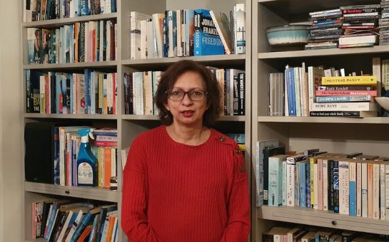 A picture of Rachel Thomas, the owner of Parade's End Books, in her new bookshop