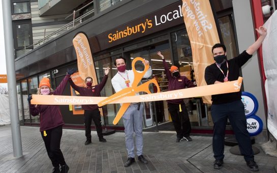 The ribbon is cut for the opening of Sainsbury's Local outside Twickenham Stadium