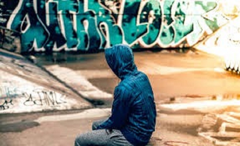 child sat alone in a skate park