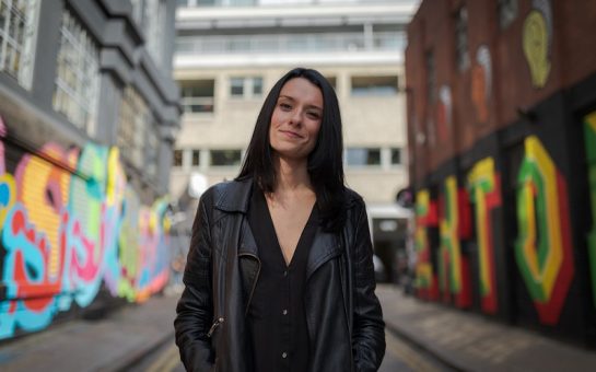 Love and London founder Jessica Dante stands facing the camera in a side street. Credit Jessica Dante