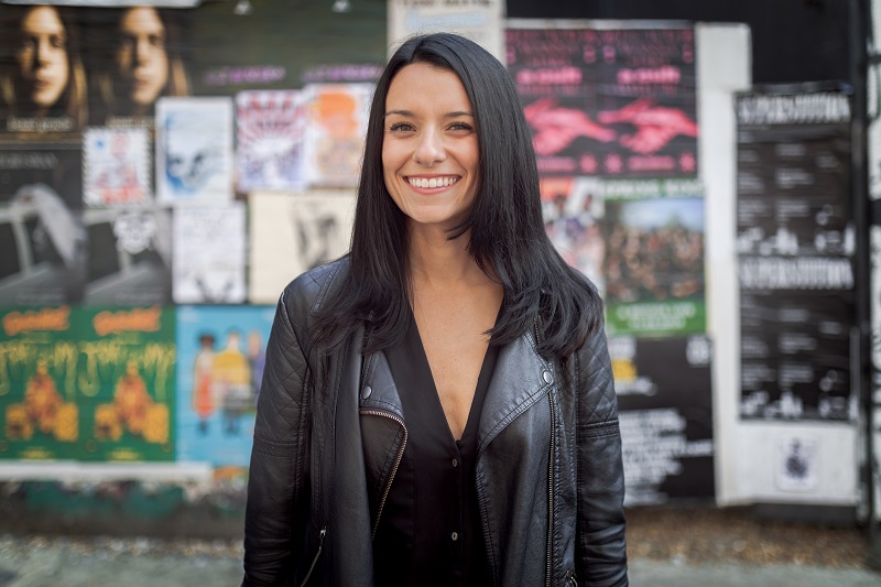 Love and London founder Jessica Dante stands facing the camera in a side street. Credit Jessica Dante