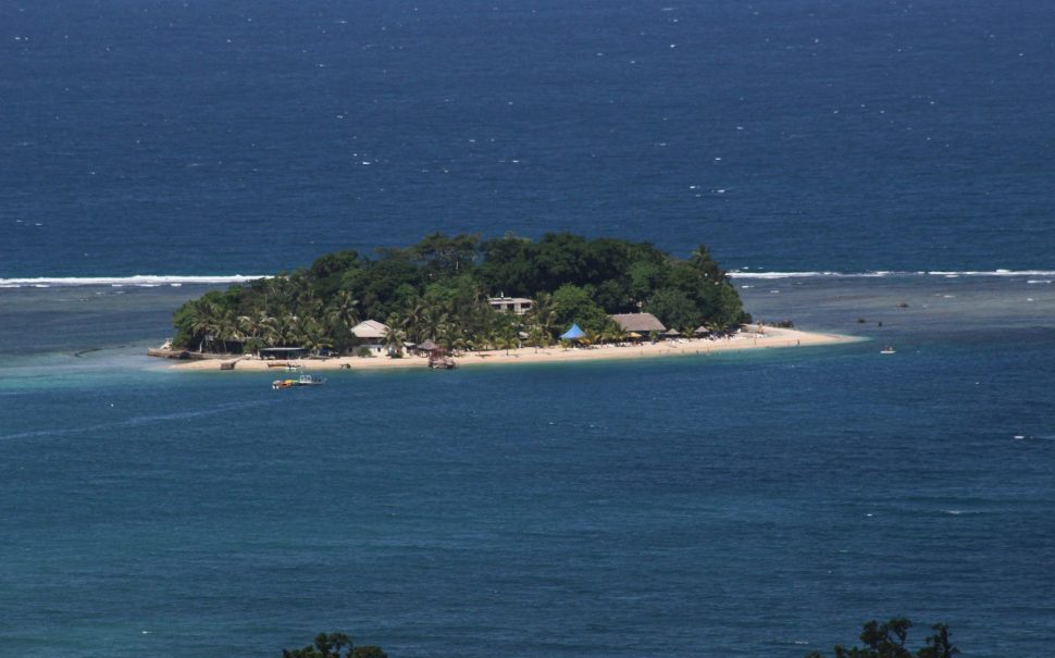 An island of white sand beaches in the South Pacific Ocean