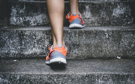 person walking up stairs