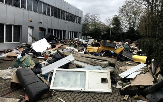 Flytipped waste in Tolworth business.