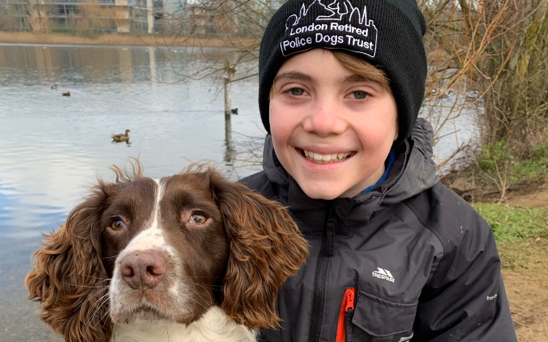 PC Phil Wells' son Thomas, 12, with police dog Parker