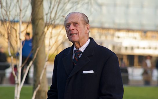 Prince Phillip looks at sky