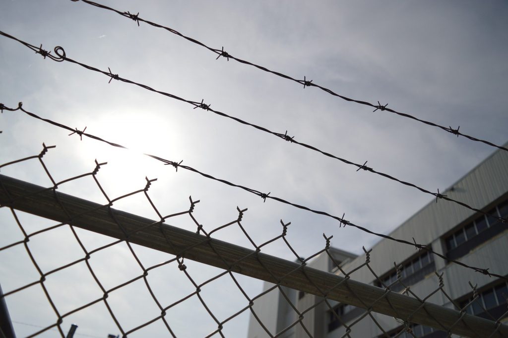 Barbed wire and chain link fencing in a prison