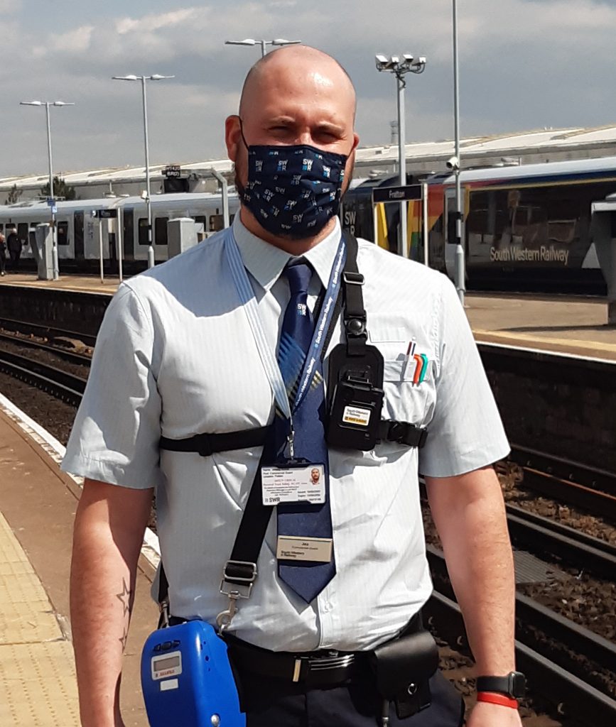 An SWR guard wearing a body cam at Fratton station, Portsmouth