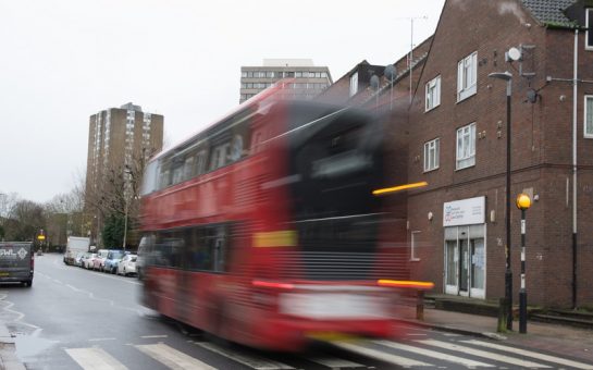 A bus moves past the SWLLC office