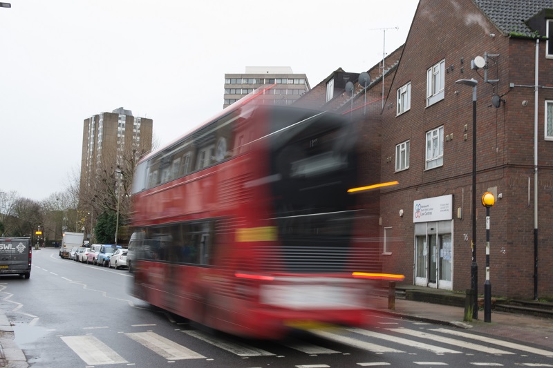 A bus moves past the SWLLC office