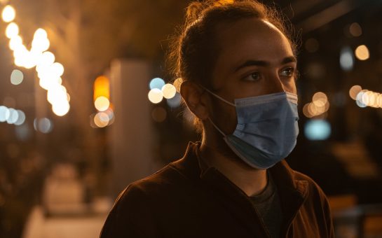 man wearing a mask at night
