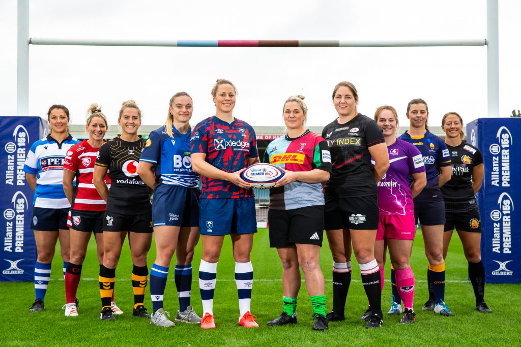 Representatives of all the Premier 15s team, including Harlequins skipper Rachel Burford, pose under the sticks at Twickenham Stoop