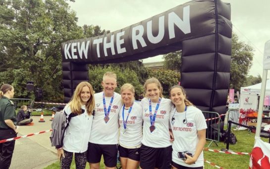 Tokyo Olympian Steph Davis poses with her family at the Richmond RUNFEST.