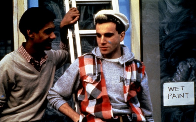 A still from "My Beautiful Laundrette" showing Omar and Johnny outside the laundrette.